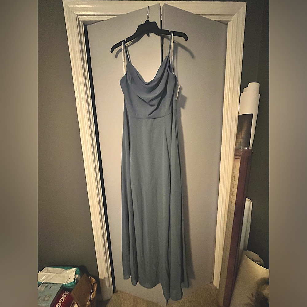 Size 12 unaltered brand new brides maids dress David’s Bridal! Steel Blue color